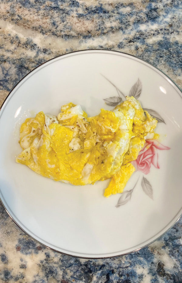 soft-fried egg on a plate.