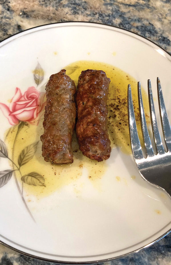 Turkey sausage links on a plate.