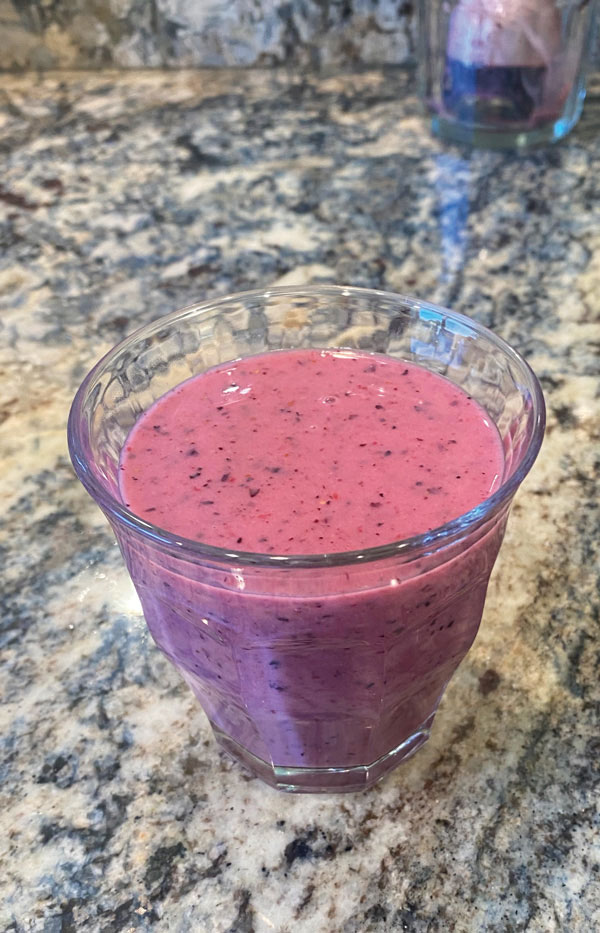 Wellness Smoothie shown in a glass.